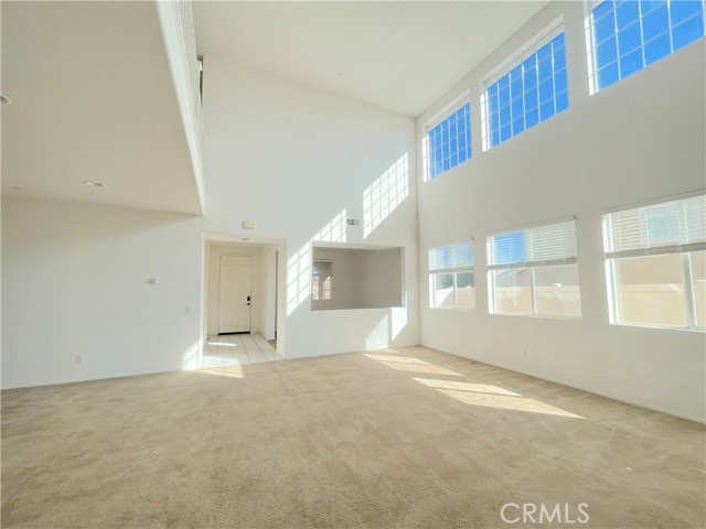 Welcome to this beautiful high ceiling house. it has 4 bedrooms and 3 bathrooms. with a super large space of 4163 SQFT. you and your family have enough space to enjoy life here. this house was built in 2015, all the amenities are almost brand new . so you don't have to worry about replacing any equipment in the future. In terms of getting around, it's also very close to freeway 60 and only 10 minutes from UCR. Don't miss this opportunity