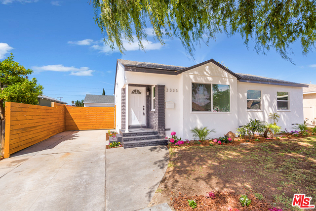 2333 Rochelle Ave Monrovia, California Move in ready! Charming remodeled house with a new kitchen, floors, paint, landscaping and fencing. This beautiful home offers a unique floorplan perfect for entertaining. As you enter the home a bright freshly painted living room with a large window greets you. The new kitchen large family room and remodeled bathroom can all be seen from the cozy living room. The bedrooms are spacious and bright. The master has a large shower with a skylight and a large walk in closet. The backyard is spacious with a detached garage that has a bonus room in the back. Will not last....