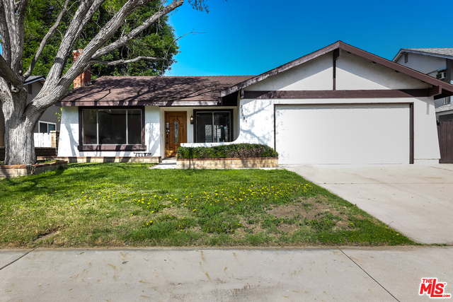 23689 Via Lupona Santa Clarita, California This Valencia one-story home offers a two-car garage.