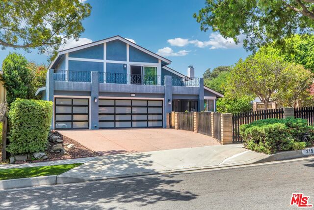 315 Grand Ave Monrovia, California Beautiful single family home in the Prime Location of Monrovia. Property consists of living room w/ raised brick fireplace & high ceiling. Spacious dining area that can accommodate large gatherings. Kitchen w/ high end Viking stove & refrigerator, cabinets with crown molding, granite counters & stone tile flooring. Separate family room that opens to the backyard. There is a bedroom & a powder room downstairs. Upstairs has master suite & opens to the large balcony w/ view of the mountain, bathroom with shower & double sink. Two additional spacious bedrooms & 1 full bath complete the upper floor. Backyard has large covered patio surrounded by lush plantings which is perfect for relaxing & entertaining. Entire house has copper plumbing & updated electric. Abundance of natural light, gorgeous hardwood floor & base crown molding throughout. Central air/heat, solar panel & water softener owned by seller & 3 car garage. Minutes to Old Town Monrovia, restaurants & shopping. This house has so much to offer. Must See!
