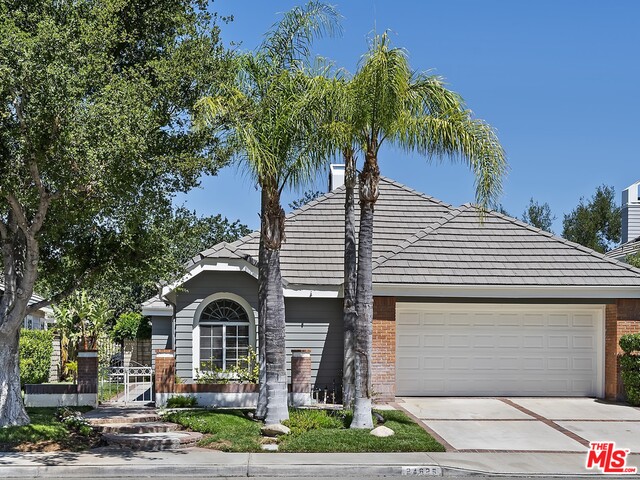 24625 Saint Denis Ct Santa Clarita, California Beautiful Valencia Summit Single Story home with a VIEW! Situated on a quiet and private cul-de-sac with no through traffic and easy access to the 5 fwy. NO Mello Roos! Light and bright 3BD + 3BA, 2000 sq-ft Single Story cottage with a pool size backyard. Original floor plan has been expanded to include a bonus family room with 2nd fireplace leading to backyard. Vaulted ceilings in family/living room with hardwood floors throughout. Bright and spacious kitchen offers newer dishwasher, breakfast nook and garden windows. Large and separate master bedroom offers private access to backyard patio. Master bathroom has been completely renovated and includes walk in closet, his/her sinks, high ceilings and skylights. Designated laundry room with washer and dryer included. Guest bathroom has also been completely renovated. Large bedrooms with plenty of room for a king size bed. Private and spacious backyard offers a wraparound patio with low maintenance landscaping. Enjoy the sunset views from the covered patio overlooking the Santa Clarita Valley. Oversized garage offers ample overhead storage and built in storage cabinets. Newer water heater. HVAC has recently been serviced. HOA ($50 monthly) offers community pools, paseos, tennis courts and clubhouse. Ideally located near COC, mall, shops, restaurants, schools and 5 freeway in the heart of Valencia.