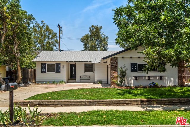 4141 Carlotta St Simi Valley, California Located on a quiet, tree lined street in Central Simi Valley, this newly updated home is move-in ready! This three bedroom, two bathroom home features a fully updated main bathroom, and an ensuite bath off of the third bedroom. Interior updates were completed in 2021 and include a brand new kitchen with LG stainless steel appliances, granite counter tops and soft close cabinetry. Throughout the house you'll find beautiful vinyl flooring, recessed lighting, central AC and heat, and updated windows. A full size laundry room off of the kitchen allows for side-by-side washer and dryer. Outside boasts new paint, landscaping with sprinkler/drip system, fresh grass and colorful flowers. There's also a cozy brick patio to sit and enjoy the large backyard. A spacious 2 car garage has been finished with new drywall and houses the tankless water heater. Other updates include a newer roof and copper plumbing. All this is close to shopping, restaurants, schools, parks and theaters. Take advantage of this opportunity to make this beautiful house your new home! It's certain to go quickly!